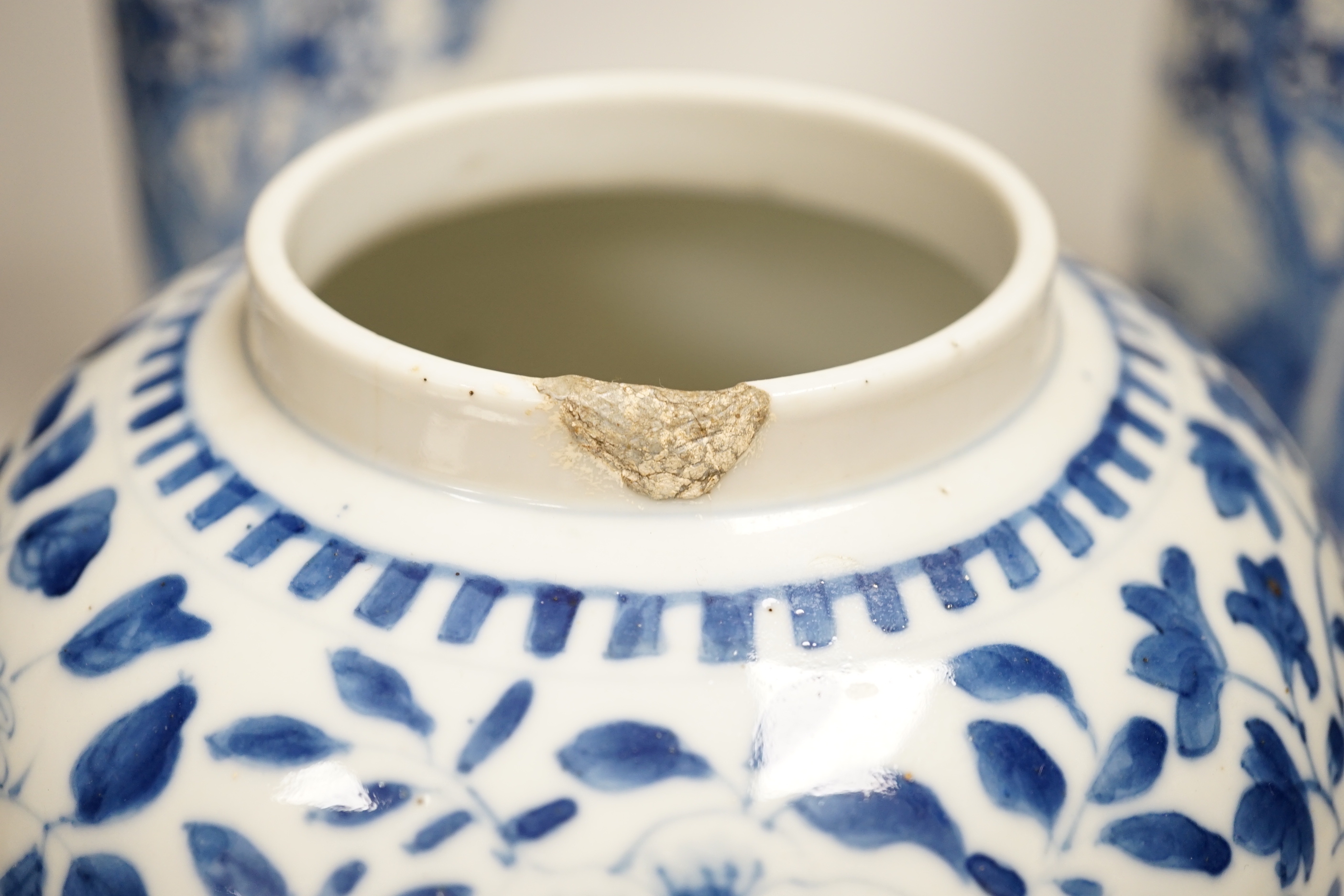 A pair of 19th century Chinese blue and white sleeve vases, and a similar ovoid ‘dragon’ jar, vases 31cm high